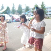 Ward Children playing with bubbles